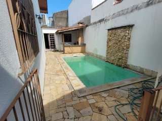 Casa no Jardim Paraíba em Aparecida com 4 quartos.