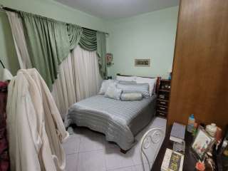 Casa no Jardim Paraíba em Aparecida com 4 quartos.